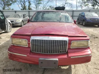 1995 Lincoln Town Car Signature with VIN 1LNLM82W2SY713693, listed as a Copart auction lot 75430484 with 156,859 mi miles and Salvage Title. Bid and sale history available at carsss.com. Image 5.