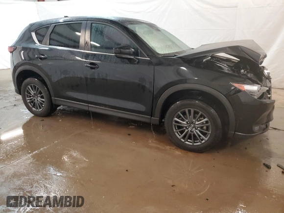 2021 Mazda CX-5 Sport with VIN JM3KFABM4M0334722, listed as a Copart auction lot 44021125 with 64,590 mi miles and Clean Title. Bid and sale history available at carsss.com. Image 4.