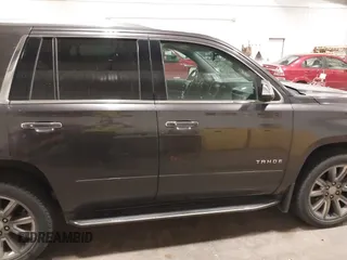 2016 Chevrolet Tahoe LTZ with VIN 1GNSKCKC1GR201155, listed as a IAAI auction lot 42235228 with 184,585 mi miles and . Bid and sale history available at DreamBid. Image 13.