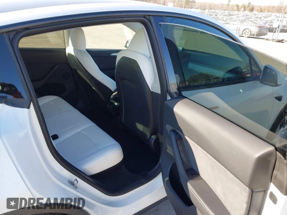 2023 Tesla Model Y Long Range with VIN 7SAYGDEE5PA094253, listed as a IAAI auction lot 41701966 with 29,458 mi miles and . Bid and sale history available at DreamBid. Image 8.