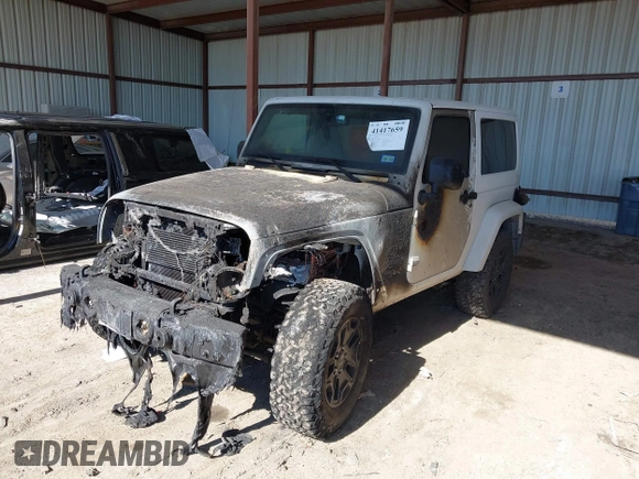 2015 Jeep Wrangler Altitude z VIN 1C4GJWBG2FL714146, wystawiony jako IAAI lot #41417659 z przebiegiem Nie podano mil oraz . Historia ofert i sprzedaży dostępna na DreamBid. Obrazek 2.
