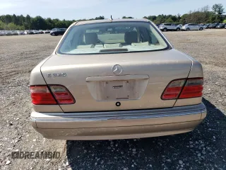 2000 Mercedes-Benz E-Class with VIN WDBJF65J2YB165568, listed as a Copart auction lot 70003994 with 146,518 mi miles and Salvage Title. Bid and sale history available at carsss.com. Image 6.