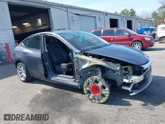 2023 Tesla Model Y Long Range with VIN 7SAYGDEE7PF856985, listed as a IAAI auction lot 42097675 with 13,112 mi miles and . Bid and sale history available at DreamBid. Image 1.