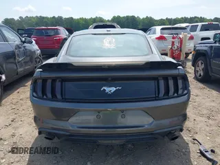 2019 Ford Mustang EcoBoost z VIN 1FA6P8TH0K5199276, wystawiony jako IAAI lot #42491713 z przebiegiem 135 710 mil mil oraz . Historia ofert i sprzedaży dostępna na DreamBid. Obrazek 17.