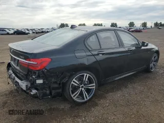 2019 BMW 7 Series 750i xDrive with VIN WBA7B0C53KG527537, listed as a Copart auction lot 64113345 with 36,820 mi miles and Salvage title. Bid and sale history available at DreamBid. Image 3.