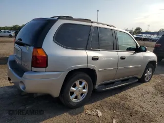 2007 GMC Envoy SLT with VIN 1GKDT13S472232289, listed as a Copart auction lot 66589034 with 158,973 mi miles and Clean Title. Bid and sale history available at DreamBid. Image 3.