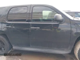 2011 Chevrolet Tahoe Commercial with VIN 1GNLC2E00BR325388, listed as a IAAI auction lot 41472731 with 265,781 mi miles and . Bid and sale history available at DreamBid. Image 14.
