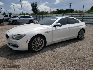 2015 BMW 6 Series 650i with VIN WBA6B2C58FGB99418, listed as a Copart auction lot 68117374 with 98,964 mi miles and Non Repairable. Bid and sale history available at carsss.com. Image 1.