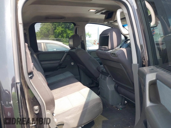 2007 Nissan Titan XE z VIN 1N6AA07A87N209125, wystawiony jako IAAI lot #42370163 z przebiegiem 257 543 mil mil oraz . Historia ofert i sprzedaży dostępna na DreamBid. Obrazek 8.