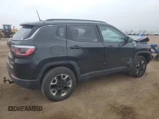 2018 Jeep Compass Trailhawk with VIN 3C4NJDDB6JT207289, listed as a Copart auction lot 56013675 with 83,385 mi miles and Salvage title. Bid and sale history available at DreamBid. Image 3.