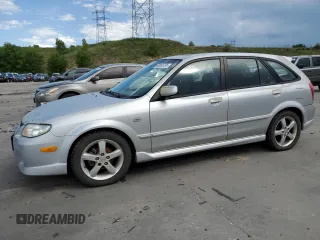 2003 Mazda Protege z VIN JM1BJ245931158925, wystawiony jako Copart lot #60086785 z przebiegiem 347 952 mil mil oraz Czysty tytuł • Clean title. Historia ofert i sprzedaży dostępna na DreamBid. Obrazek 1.