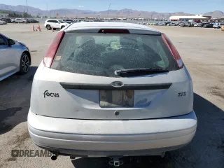 2000 Ford Focus ZX3 with VIN 3FAFP3132YR183435, listed as a Copart auction lot 60214034 with Not provided miles and Salvage title. Bid and sale history available at DreamBid. Image 6.