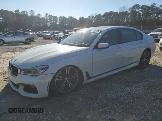 2016 BMW 7 Series 750i with VIN WBA7F0C56GGL99161, listed as a Copart auction lot 87652655 with 97,805 mi miles and Salvage Title. Bid and sale history available at carsss.com. Image 1.