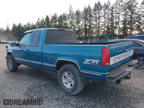 1997 Chevrolet Silverado 1500 with VIN 2GCEK19R2V1262153, listed as a IAAI auction lot 41752380 with 151,375 mi miles and . Bid and sale history available at DreamBid. Image 3.