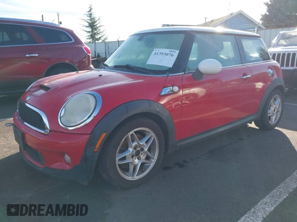 2010 MINI Hardtop S with VIN WMWMF7C50ATZ69911, listed as a IAAI auction lot 41393076 with 94,891 mi miles and . Bid and sale history available at DreamBid. Image 2.