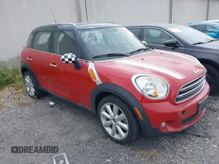 2015 MINI Countryman z VIN WMWZB3C51FWR44130, wystawiony jako IAAI lot #42218448 z przebiegiem 148 409 mil mil oraz . Historia ofert i sprzedaży dostępna na DreamBid. Obrazek 1.