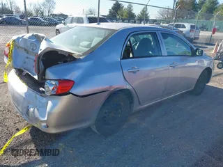 2010 Toyota Corolla with VIN 2T1BU4EE9AC322961, listed as a IAAI auction lot 40879803 with 146,996 mi miles and . Bid and sale history available at DreamBid. Image 4.