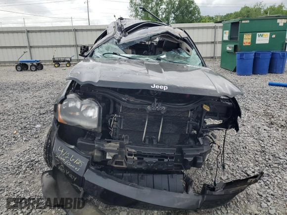 2009 Jeep Grand Cherokee Limited with VIN 1J8HS58T09C554863, listed as a Copart auction lot 55008995 with 136,762 mi miles and Salvage title. Bid and sale history available at DreamBid. Image 5.