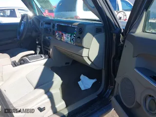 2006 Jeep Commander with VIN 1J8HG48KX6C195357, listed as a IAAI auction lot 41525843 with 158,235 mi miles. Bid and sale history available at carsss.com. Image 5.