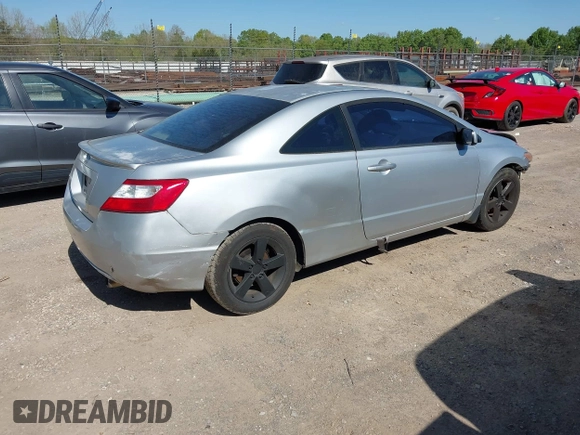 2007 Honda Civic Cpe EX with VIN 2HGFG128X7H547623, listed as a IAAI auction lot 42033010 with 228,518 mi miles. Bid and sale history available at carsss.com. Image 4.