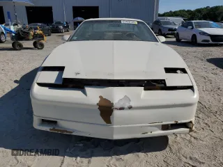 1989 Pontiac Firebird z VIN 1G2FS21S4KL260438, wystawiony jako Copart lot #57420155 z przebiegiem 132 101 mil mil oraz Czysty tytuł • Clean title. Historia ofert i sprzedaży dostępna na DreamBid. Obrazek 6.