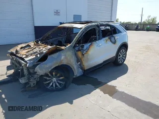 2020 Cadillac XT4 FWD Sport with VIN 1GYFZER44LF029323, listed as a IAAI auction lot 41906596 with Not Provided miles and . Bid and sale history available at carsss.com. Image 2.