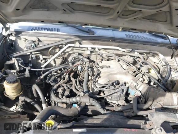 2004 Nissan Frontier XE z VIN 1N6ED27T84C446582, wystawiony jako IAAI lot #41428931 z przebiegiem Nie podano mil oraz . Historia ofert i sprzedaży dostępna na DreamBid. Obrazek 10.