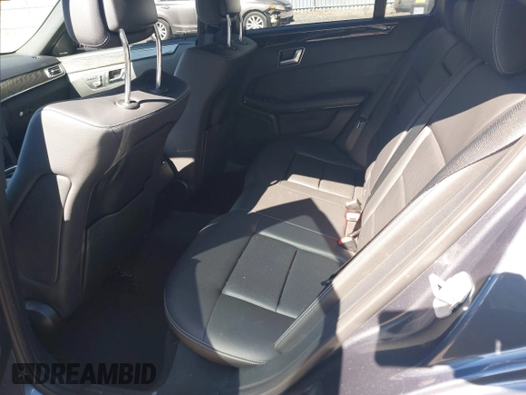 2016 Mercedes-Benz E with VIN WDDHF8JB7GB232874, listed as a IAAI auction lot 41735578 with 53,521 mi miles. Bid and sale history available at carsss.com. Image 8.