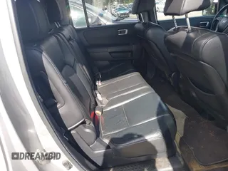 2013 Honda Pilot EX-L with VIN 5FNYF4H71DB041562, listed as a IAAI auction lot 41819184 with 136,014 mi miles and . Bid and sale history available at DreamBid. Image 8.