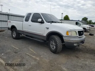 2003 Ford F-150 XL z VIN 2FTRX18L93CA55860, wystawiony jako Copart lot #57402295 z przebiegiem 312 879 mil mil oraz Szkoda całkowita • Salvage title. Historia ofert i sprzedaży dostępna na DreamBid. Obrazek 4.