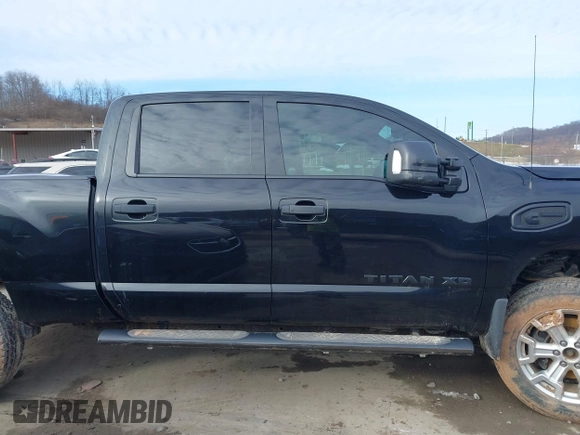2018 Nissan Titan XD SV with VIN 1N6BA1F49JN521838, listed as a IAAI auction lot 41606878 with 143,742 mi miles. Bid and sale history available at carsss.com. Image 14.