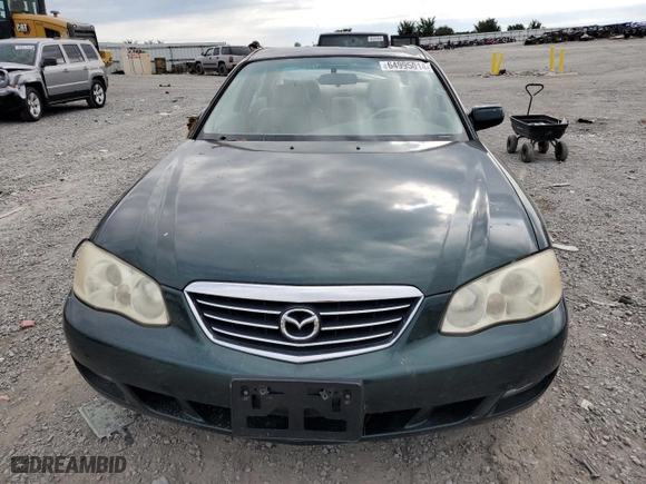 2001 Mazda Millenia with VIN JM1TA221011708952, listed as a Copart auction lot 64995014 with NaN miles and Salvage Title. Bid and sale history available at carsss.com. Image 5.