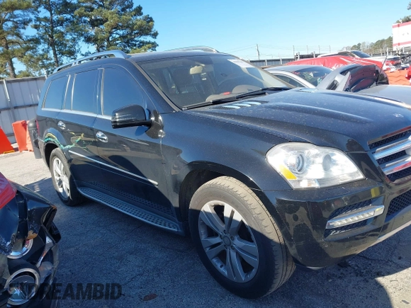 2012 Mercedes-Benz GL 450 z VIN 4JGBF7BE2CA795653, wystawiony jako IAAI lot #41847301 z przebiegiem 144 137 mil mil oraz . Historia ofert i sprzedaży dostępna na DreamBid. Obrazek 13.
