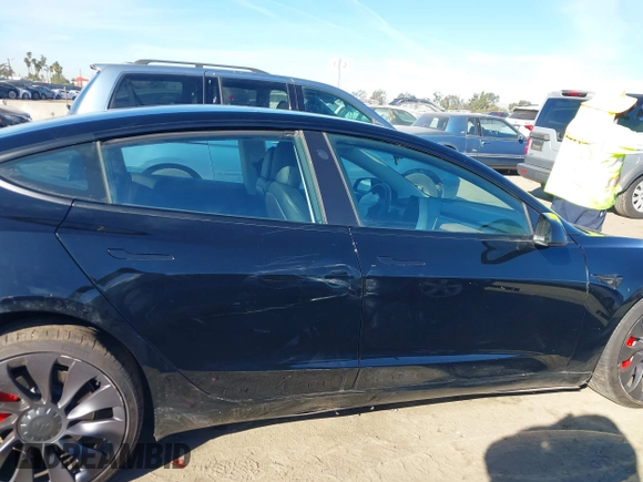 2021 Tesla Model 3 Performance with VIN 5YJ3E1EC6MF999321, listed as a IAAI auction lot 41417451 with 20,562 mi miles and . Bid and sale history available at carsss.com. Image 13.