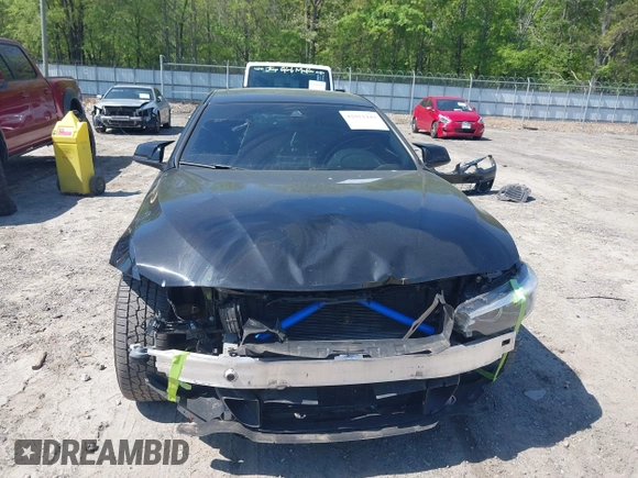 2019 BMW 4 Series 430i with VIN WBA4J1C59KBM17309, listed as a IAAI auction lot 42011443 with 87,189 mi miles. Bid and sale history available at carsss.com. Image 13.