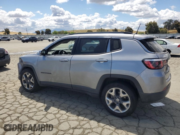 2020 Jeep Compass Limited with VIN 3C4NJCCB3LT128807, listed as a Copart auction lot 56673705 with 94,903 mi miles and Salvage title. Bid and sale history available at DreamBid. Image 2.