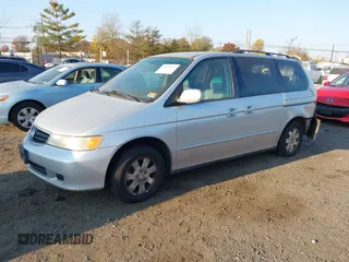 2004 Honda Odyssey EX-L with VIN 5FNRL18964B025323, listed as a IAAI auction lot 40714457 with 164,786 mi miles and . Bid and sale history available at DreamBid. Image 2.