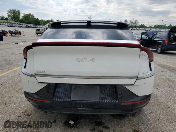 2022 Kia EV6 Wind z VIN KNDC3DLC6N5053572, wystawiony jako Copart lot #54911685 z przebiegiem 26 829 mil mil oraz Szkoda całkowita • Salvage title. Historia ofert i sprzedaży dostępna na DreamBid. Obrazek 6.