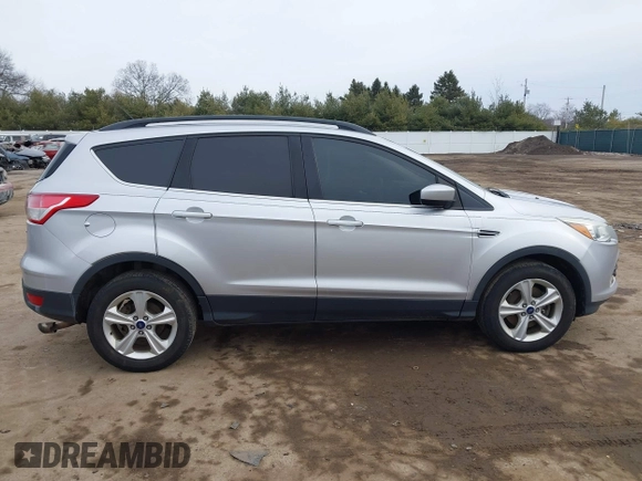 2016 Ford Escape SE with VIN 1FMCU9G94GUC06902, listed as a IAAI auction lot 41432640 with 200,575 mi miles. Bid and sale history available at carsss.com. Image 14.