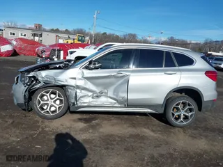 2018 BMW X1 xDrive28i with VIN WBXHT3C36J5L33781, listed as a IAAI auction lot 41497360 with 61,251 mi miles. Bid and sale history available at carsss.com. Image 14.