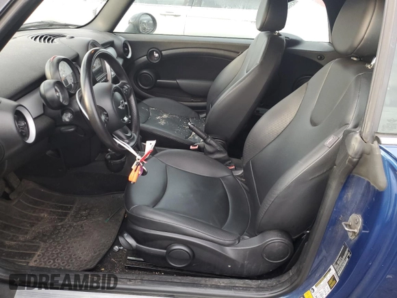 2014 MINI Convertible with VIN WMWZN3C53ET861225, listed as a Copart auction lot 87791665 with 104,151 mi miles and Salvage title. Bid and sale history available at DreamBid. Image 7.