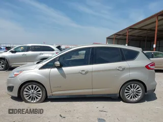 2018 Ford C-Max SE with VIN 1FADP5AU8JL102227, listed as a IAAI auction lot 42062394 with 122,943 mi miles. Bid and sale history available at carsss.com. Image 14.