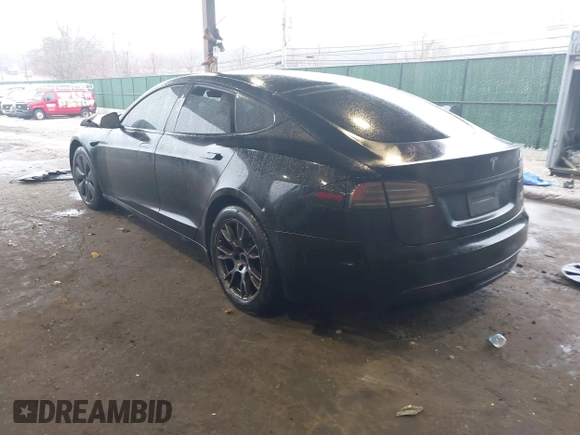 2022 Tesla Model S Plaid with VIN 5YJSA1E64NF477855, listed as a IAAI auction lot 41470591 with Not provided miles and . Bid and sale history available at DreamBid. Image 3.