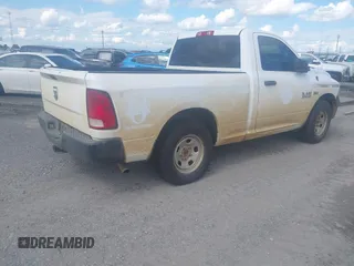 2015 Ram 1500 Tradesman with VIN 3C6JR6AT1FG574429, listed as a IAAI auction lot 42034590 with 242,093 mi miles and . Bid and sale history available at DreamBid. Image 4.