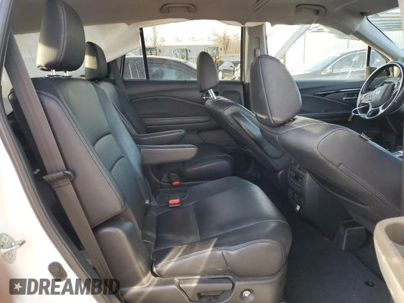 2020 Honda Pilot Touring 7-Passenger z VIN 5FNYF6H68LB002405, wystawiony jako Copart lot #46857625 z przebiegiem 69 617 mil mil oraz Szkoda całkowita • Salvage title. Historia ofert i sprzedaży dostępna na DreamBid. Obrazek 11.