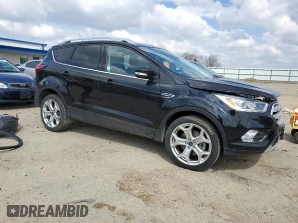 2019 Ford Escape Titanium with VIN 1FMCU9J94KUA41791, listed as a Copart auction lot 52541935 with 70,918 mi miles and Salvage Title. Bid and sale history available at carsss.com. Image 4.