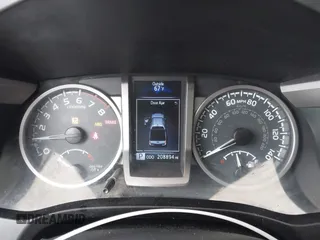 2017 Toyota Tacoma SR5 with VIN 5TFCZ5AN6HX076769, listed as a IAAI auction lot 41889869 with 208,894 mi miles. Bid and sale history available at carsss.com. Image 7.