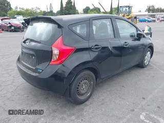2015 Nissan Note SV with VIN 3N1CE2CP9FL357159, listed as a IAAI auction lot 42448704 with 140,991 mi miles and . Bid and sale history available at DreamBid. Image 4.