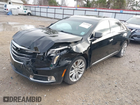 2018 Cadillac XTS Luxury with VIN 2G61M5S31J9135706, listed as a IAAI auction lot 41572396 with 140,539 mi miles. Bid and sale history available at carsss.com. Image 2.