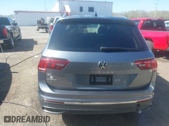 2022 Volkswagen Tiguan SE with VIN 3VV3B7AX1NM120097, listed as a IAAI auction lot 41967493 with 57,802 mi miles and . Bid and sale history available at DreamBid. Image 16.